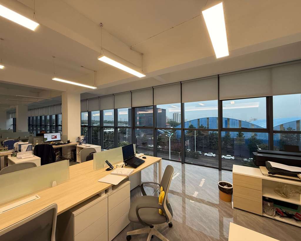 custom light filtering motorized roller shades for offices