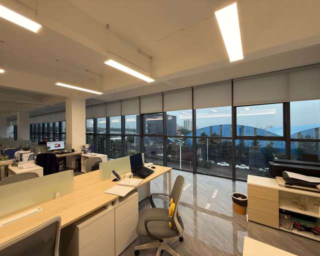 custom light filtering motorized roller shades for offices